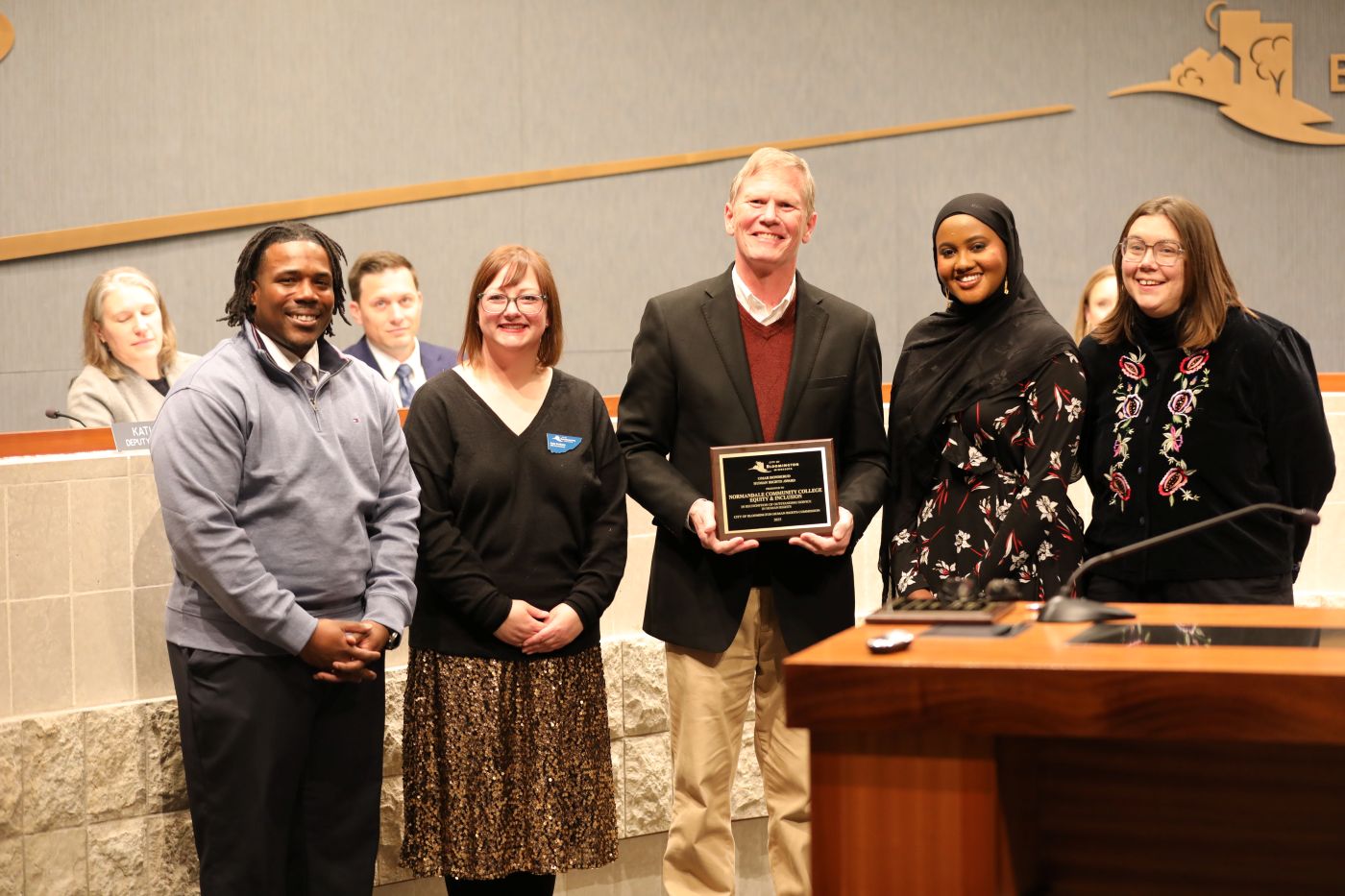 Equity and Inclusion team receiving the award from Bloomington Mayor Tim Busse